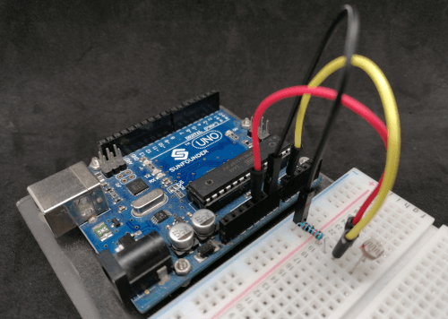 Arduino UNO with connected photoresistor via analog pin